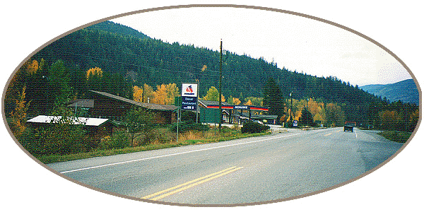 4.37 Acres, 6 self contained log cabins, a 5600 sq ft multi use building, frontage on the Moyie River ~ awesome potential